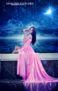 The beautiful harmonous girl in a long pink dress